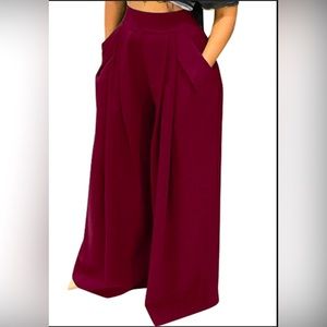 Wide leg palazzo pants with side zip. These pants are a beautiful wine color.